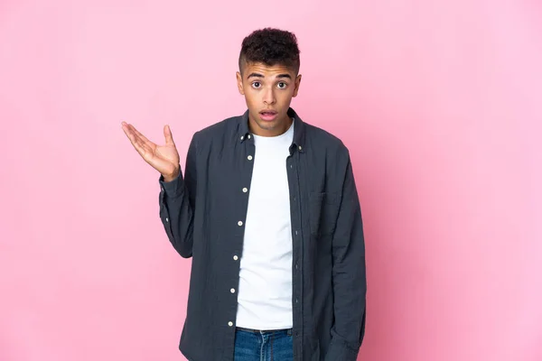 Young Brazilian Man Isolated Pink Background Making Doubts Gesture — Stock Photo, Image