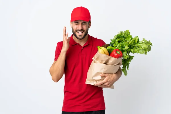 Joven Con Barba Sosteniendo Una Bolsa Llena Verduras Aisladas Sobre —  Fotos de Stock