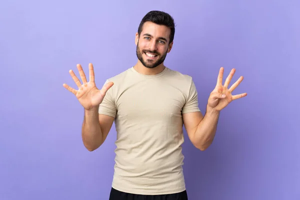 Joven Hombre Guapo Con Barba Sobre Fondo Aislado Contando Nueve — Foto de Stock