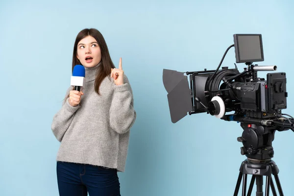 Young Reporter Woman Holding Microphone Reporting News Pointing Index Finger — Stock Photo, Image