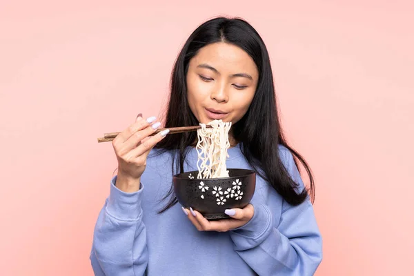 Teenager Asiatische Frau Isoliert Auf Beigem Hintergrund Hält Eine Schüssel — Stockfoto