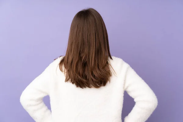 Teenager Girl Isolated Purple Background Back Position — Stock Photo, Image