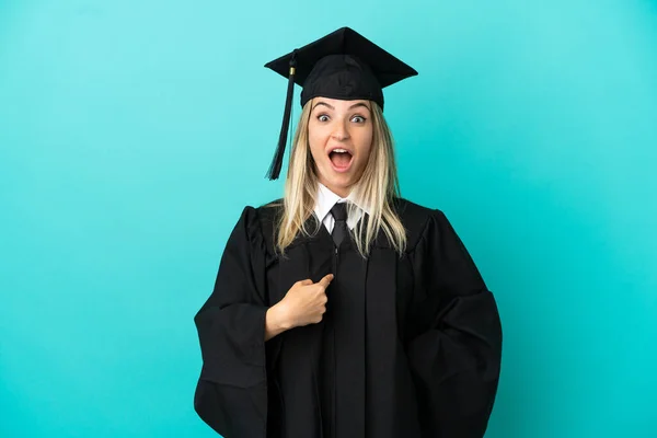 Young University Graduate Isolated Blue Background Surprise Facial Expression — ストック写真