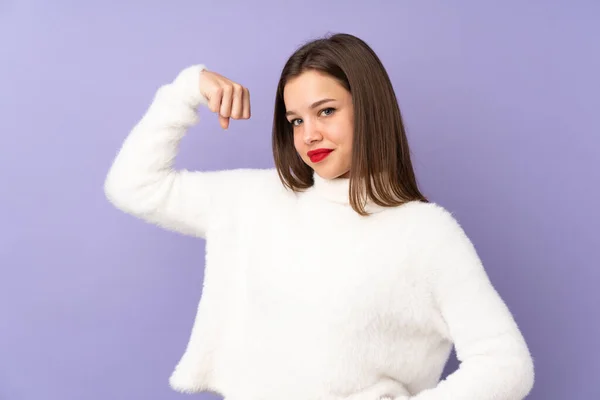 Adolescente Chica Aislado Púrpura Fondo Haciendo Fuerte Gesto —  Fotos de Stock