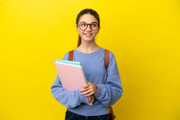 Studentin Kind Frau Über Isolierten Gelben Hintergrund Denken Eine Idee — Stockfoto