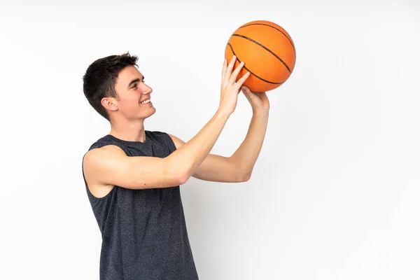 Pria Pemain Basket Muda Yang Tampan Atas Dinding Yang Terisolasi — Stok Foto