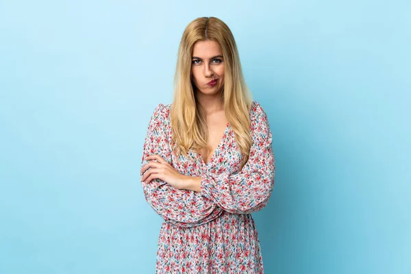 Young Uruguayan Blonde Woman Isolated Blue Background Unhappy Expression — Stock Photo, Image