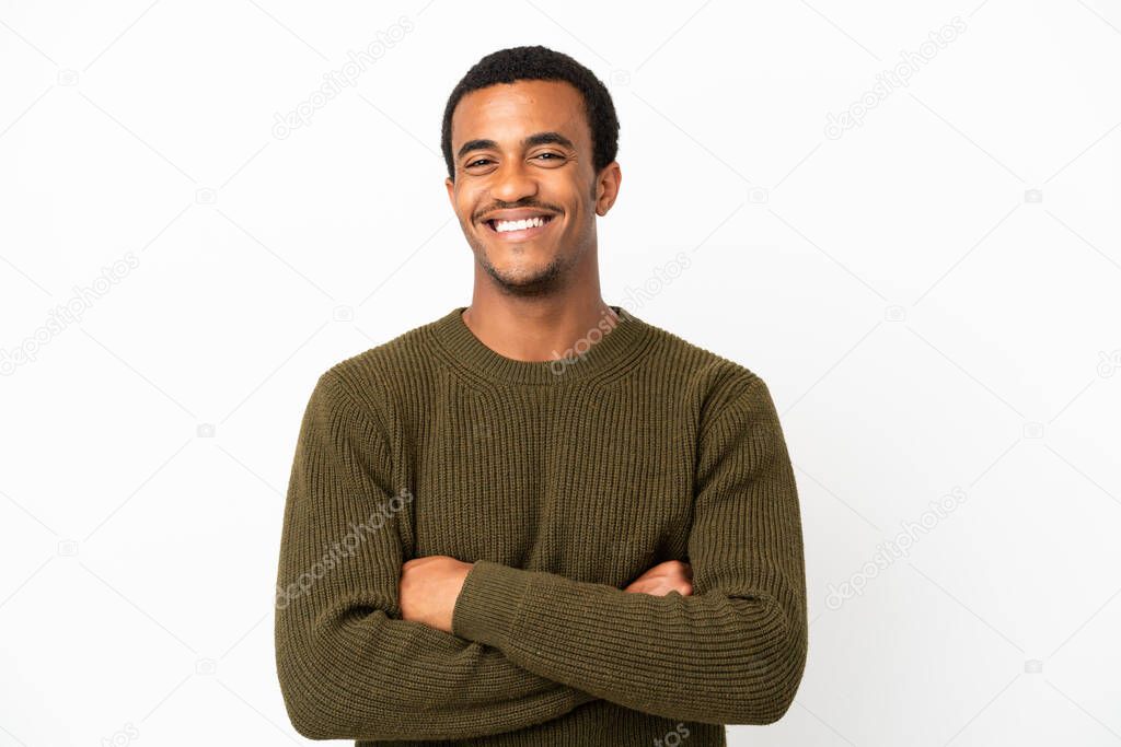 African American handsome man on isolated white background keeping the arms crossed in frontal position