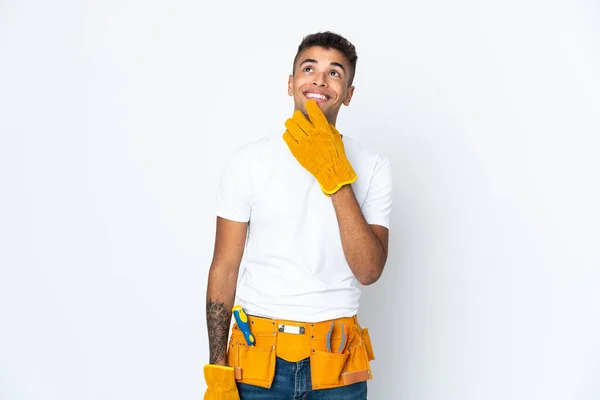 Young Brazilian Electrician Manipulated Isolated White Background Looking While Smiling — 图库照片