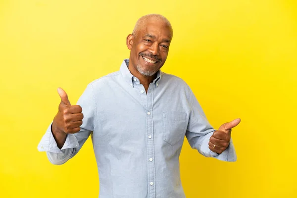 Cuban Senior Isolated Yellow Background Thumbs Gesture Smiling — Stock Photo, Image