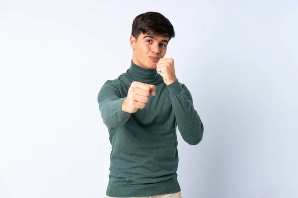 Handsome Man Isolated Blue Background Fighting Gesture — Foto Stock