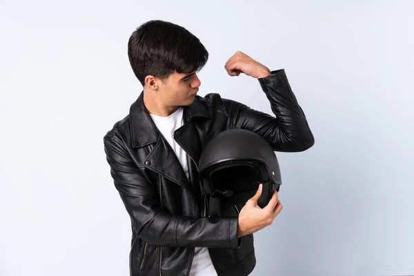 Man Motorcycle Helmet Isolated Blue Background Making Strong Gesture — Foto de Stock