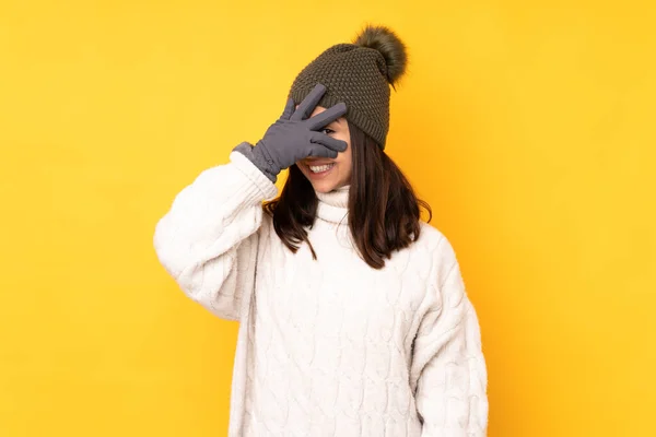 Young Woman Winter Hat Isolated Yellow Background Covering Eyes Hands — Stock Photo, Image