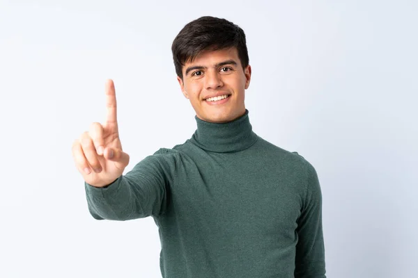 Schöner Mann Über Isoliertem Blauem Hintergrund Der Einen Finger Zeigt — Stockfoto