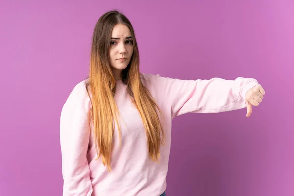 Young Caucasian Woman Isolated Purple Background Showing Thumb Negative Expression — Stock Photo, Image