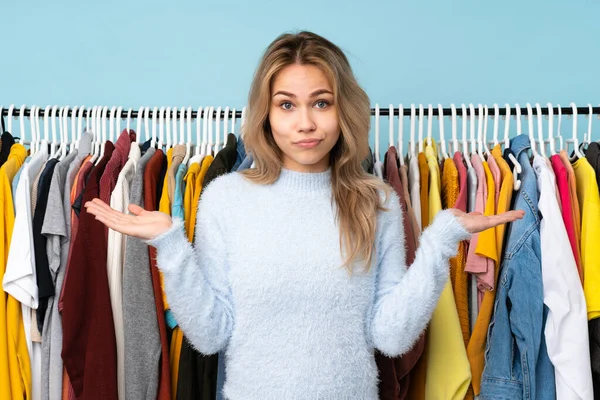 Teenager Russian Girl Buying Some Clothes Isolated Blue Background Having — Stock Fotó