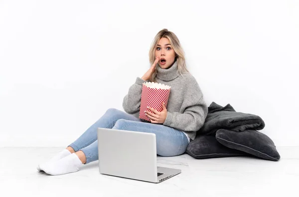 Teenager Blonde Girl Eating Popcorn While Watching Movie Laptop Surprise — Foto Stock