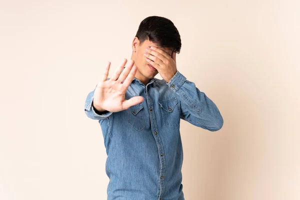 Handsome Man Isolated Beige Background Making Stop Gesture Covering Face — Stok fotoğraf