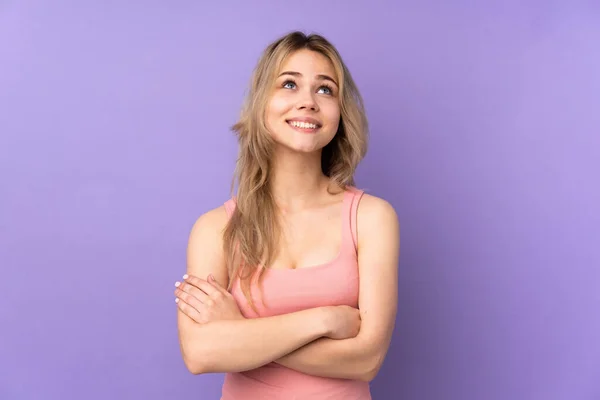 Teenager Russian Girl Isolated Purple Background Looking While Smiling — Stockfoto