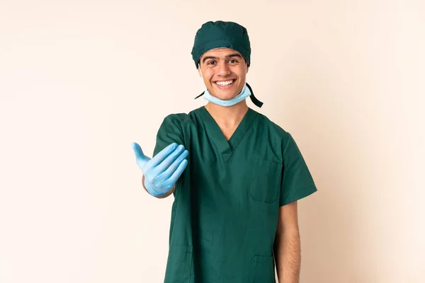 Surgeon Man Blue Uniform Isolated Background Inviting Come — 图库照片