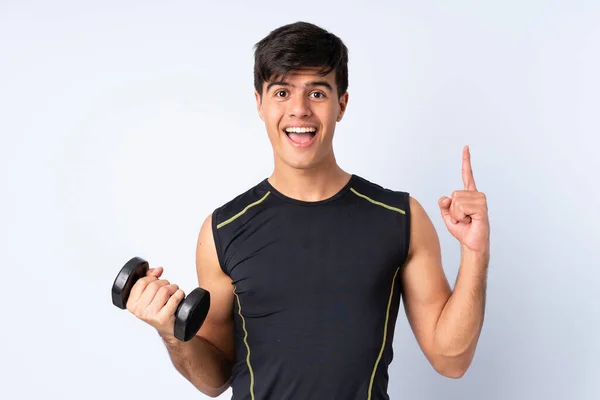 Sport Man Making Weightlifting Isolated Blue Background Pointing Great Idea — 스톡 사진