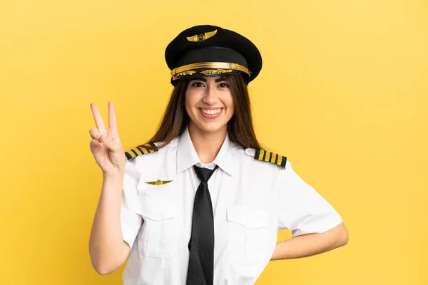 Airplane Pilot Isolated Yellow Background Smiling Showing Victory Sign — 스톡 사진