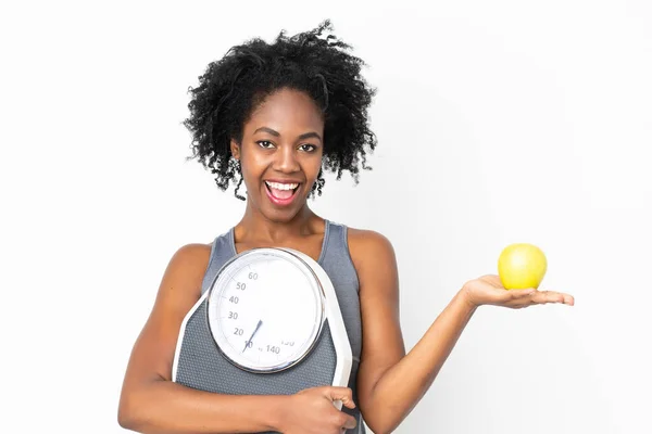 Young African American Woman Isolated White Background Weighing Machine Apple — Stock Photo, Image
