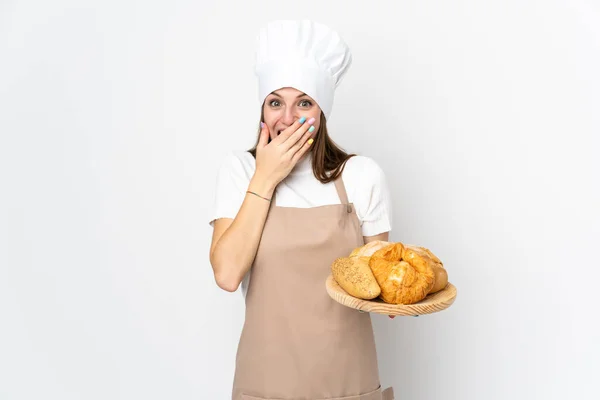 身穿厨师制服的年轻女子 背景洁白 面部表情惊讶 — 图库照片