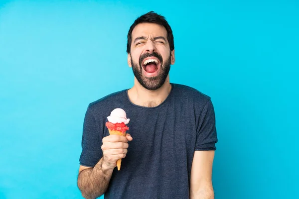 Young Man Cornet Ice Cream Isolated Blue Background Shouting Front — Stock Photo, Image