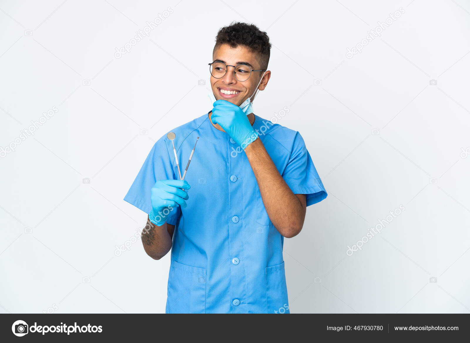 Brazilian Dentist Holding Tool Isolated White Background Looking Side