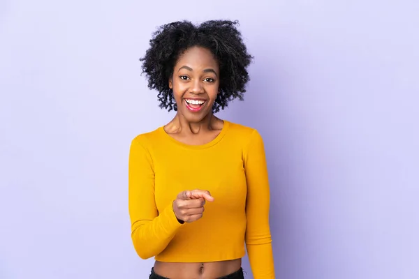 Young African American Woman Isolated Purple Background Surprised Pointing Front — Stock Photo, Image