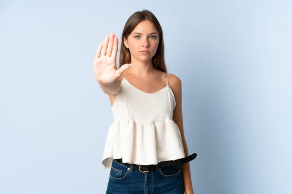 Joven Lituana Aislada Sobre Fondo Azul Haciendo Stop Gesture —  Fotos de Stock