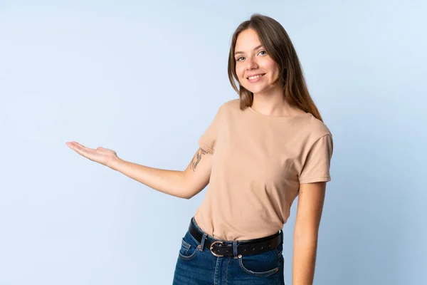 Young Lithuanian Woman Isolated Blue Background Extending Hands Side Inviting — Stock Photo, Image