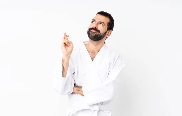 Fiatal Ember Csinál Karate Elszigetelt Fehér Háttér Ujjak Keresztbe Legjobbakat — Stock Fotó