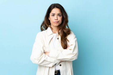 Woman over isolated background feeling upset
