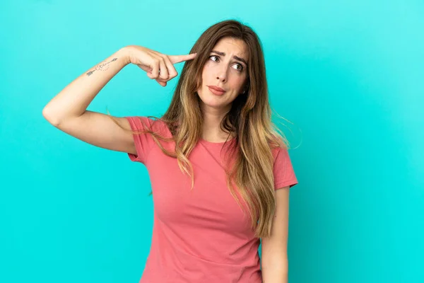 Young Caucasian Woman Isolated Blue Background Making Gesture Madness Putting — Stock Photo, Image