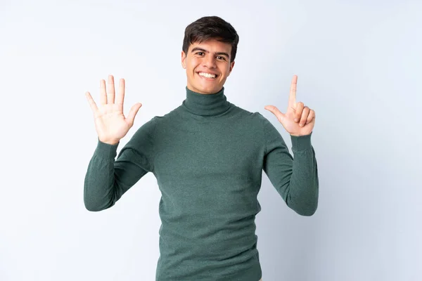 Schöner Mann Über Isoliertem Blauem Hintergrund Der Mit Den Fingern — Stockfoto