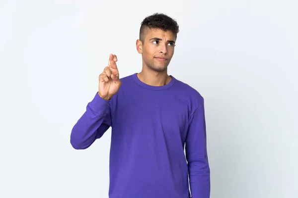 Young Brazilian Man Isolated White Background Fingers Crossing Wishing Best — Stock Photo, Image
