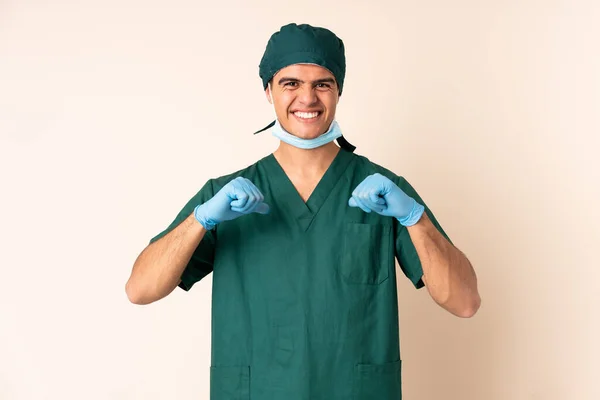 Cirujano Uniforme Azul Sobre Fondo Aislado Orgulloso Satisfecho — Foto de Stock