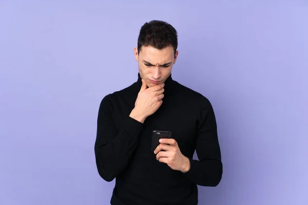Young Caucasian Handsome Man Turtleneck Sweater Isolated Purple Background Thinking — Stock Photo, Image