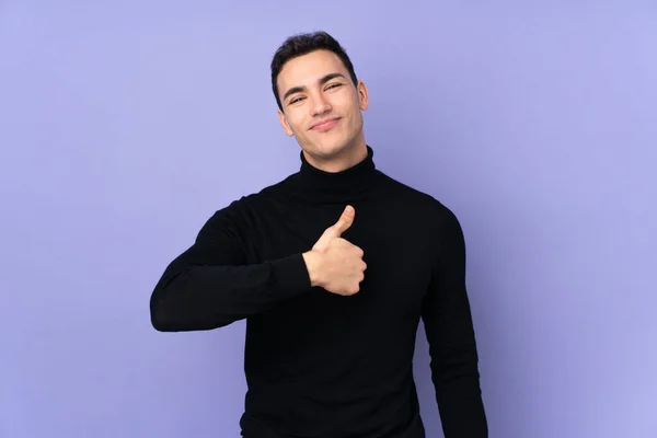 Young Caucasian Handsome Man Turtleneck Sweater Isolated Purple Background Giving — Stock Photo, Image