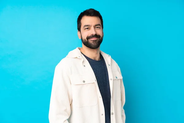 Young Handsome Man White Corduroy Jacket Isolated Blue Background Laughing — Stock Photo, Image