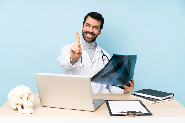 Professional Traumatologist Workplace Showing Lifting Finger — Stock Photo, Image