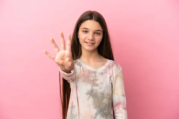 Menina Sobre Fundo Rosa Isolado Feliz Contando Quatro Com Dedos — Fotografia de Stock