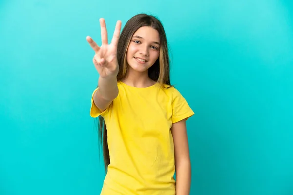 Menina Sobre Fundo Azul Isolado Feliz Contando Três Com Dedos — Fotografia de Stock