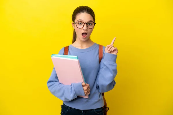 Studentisches Kind Frau Über Isolierten Gelben Hintergrund Denken Eine Idee — Stockfoto