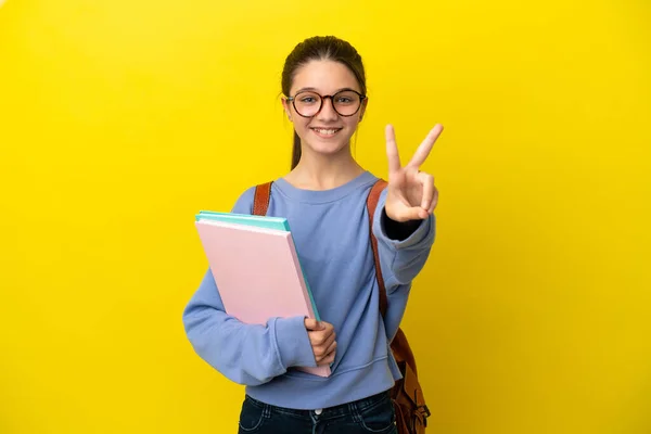 Étudiant Enfant Femme Sur Fond Jaune Isolé Souriant Montrant Signe — Photo