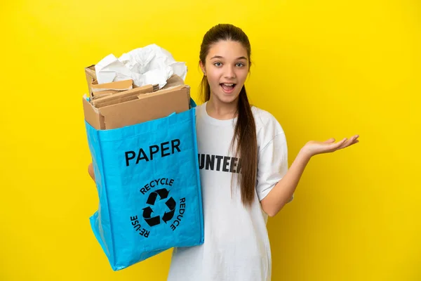 Little Girl Holding Recycling Bag Full Paper Recycle Isolated Yellow — Stock Photo, Image