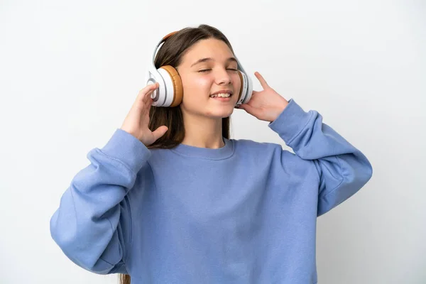 Küçük Kız Soyutlanmış Beyaz Arka Plan Müzik Dinliyor Şarkı Söylüyor — Stok fotoğraf