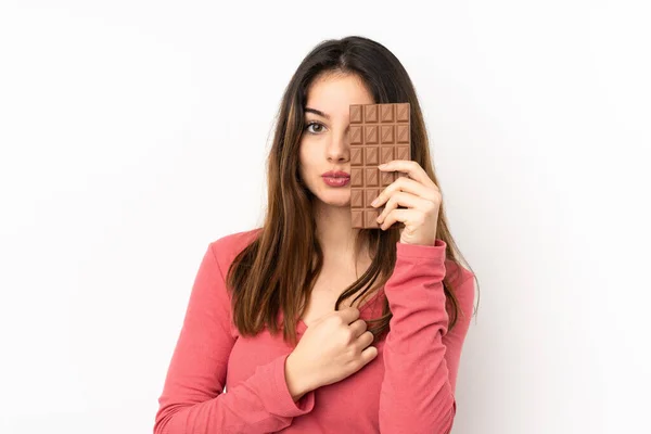 Fiatal Kaukázusi Elszigetelt Rózsaszín Háttér Figyelembe Egy Csokoládé Tabletta Meglepett — Stock Fotó